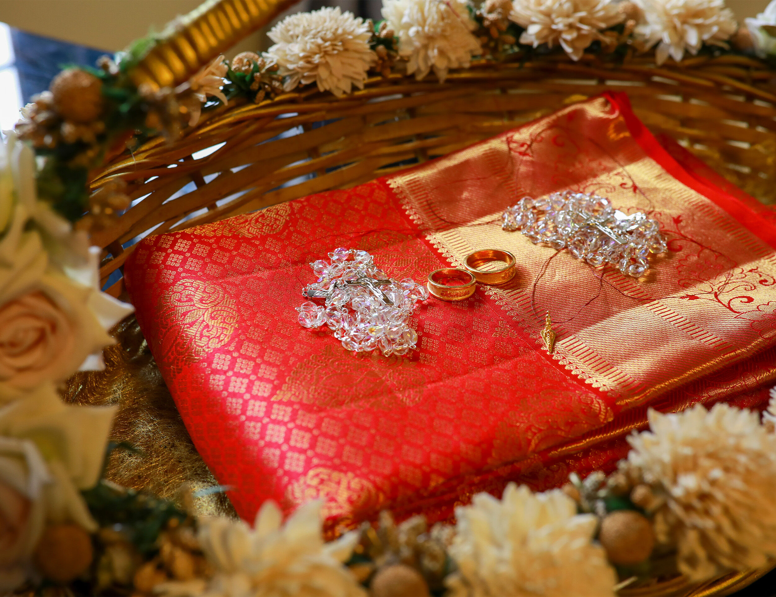 a red silk saree with jewellery